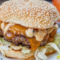 Beef Burger · cheddar, shaved onion, iceberg lettuce, special sauce, sesame bun, fries