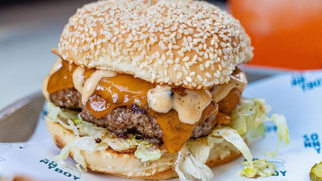 Beef Burger · cheddar, shaved onion, iceberg lettuce, special sauce, sesame bun, fries