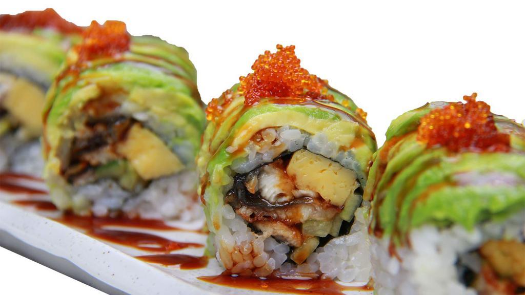 Dragon Roll · Broiled eel and sliced cucumber wrapped in rice with avocado and masago outside.