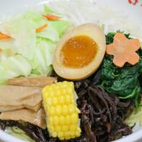 Veggie Ramen · Vegetable broth (shoyu or miso base) with wavy egg noodle topped with cabbage, carrot, seaso...