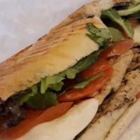 Green Chicken Panini · grilled chicken, basil pesto, mixed greens, tomato, fresh mozzarella
& roasted red peppers