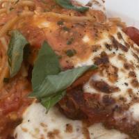 Chicken Parmigiana · mozzarella, pomodoro, basil - served with chef's choice pasta