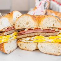 Belly Buster · Pork roll, bacon, sausage, egg, and cheese.