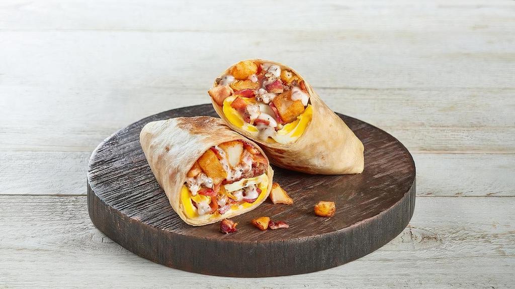 Homestyle Huddle Wrap · Two scrambled eggs, bacon, sausage gravy, shredded cheddar, and skillet potatoes served in a warm grilled tortilla.  Cal 745-940