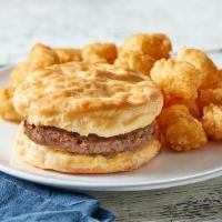 Sausage Biscuit Combo · Country sausage on a fluffy, buttery biscuit. Served with hashbrowns or tater tots and your ...
