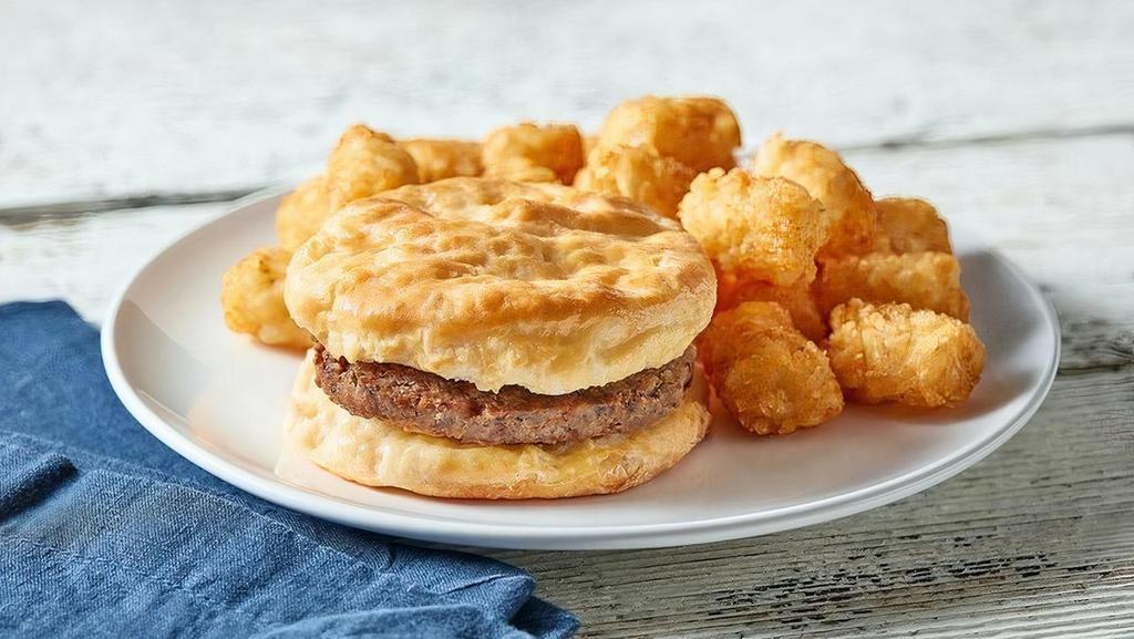 Sausage Biscuit Combo · Country sausage on a fluffy, buttery biscuit. Served with hashbrowns or tater tots and your choice of coffee, soft drink, or regular iced tea. Cal 585-1065