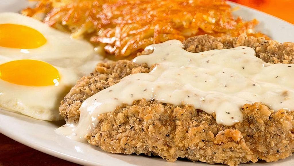 2 Eggs & Country Fried Steak · Country Fried Steak served with 2 Farm-Fresh eggs* cooked to order, homestyle grits or crispy hashbrowns or seasonal fruit, and buttery toast or biscuit (Cal 1035-1230)