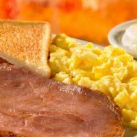 2 Eggs & Country Ham · Served with 2 Farm-Fresh eggs* cooked to order, homestyle grits or crispy hashbrowns or seas...