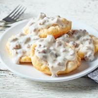 2 Biscuits & Gravy · Two fluffy, open-faced biscuits topped with country sausage gravy.