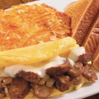 Omelet- Prime Rib Tips · Tender prime rib tips, Swiss cheese, sautéed mushrooms and caramelized onions served with yo...