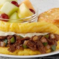 Omelet-Philly Cheesesteak · Thinly sliced steak, Swiss cheese, diced onions and green bell peppers served with your choi...