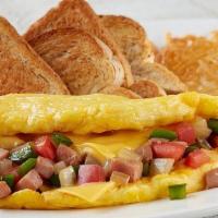 Omelet-Western · Diced sugar cured ham, American cheese, green bell peppers, onions and tomatoes served with ...