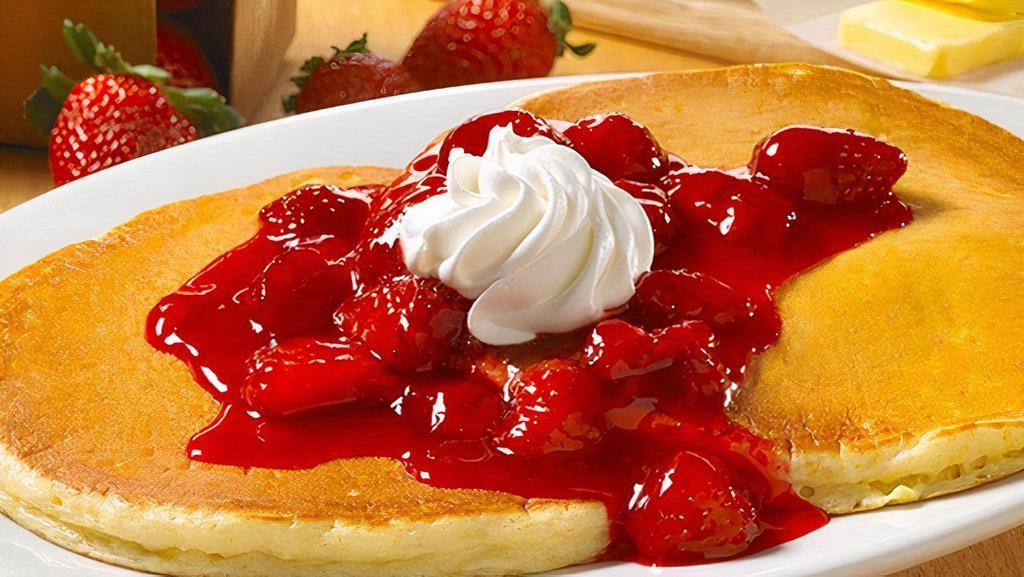 Strawberries & Cream Sweet Cakes · Pancakes Perfected: Two platter-sized, thick and fluffy pancakes, topped with sweetness and covered with sweet strawberry and whipped toppings (Cal 690)