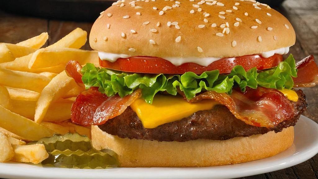 Applewood Smoked Bacon Huddleburger® · Our classic double burger with two grilled beef patties, 2 slices of Applewood smoked bacon, melted aged cheddar cheese, fresh lettuce, sliced tomato and pickle chips on a toasted brioche bun (Cal 985-1460)