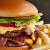 Mega Bacon Cheese Huddleburger® · Two-patty burger stacked with four strips of Applewood smoked bacon, melted cheddar cheese, ...
