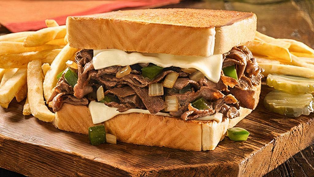 Famous Philly Cheesesteak · Seasoned beefsteak, grilled onions, green bell peppers and melted Swiss cheese on Texas Toast (Cal 555-1030)