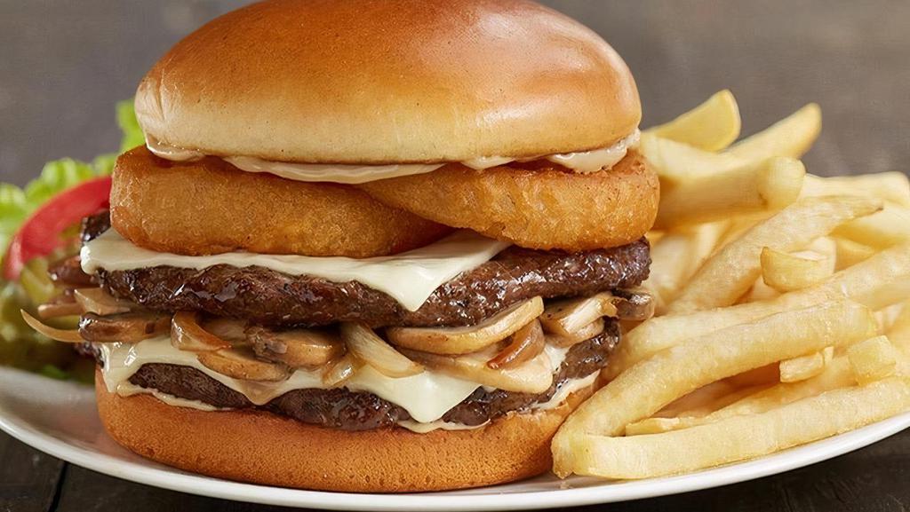 Double Mushroom Swiss Huddleburger® · A juicy two-patty burger loaded with Swiss cheese, caramelized onions, sliced mushrooms, fried onion ring and garlic mayonnaise on a toasted brioche bun (Cal 1265-1740)