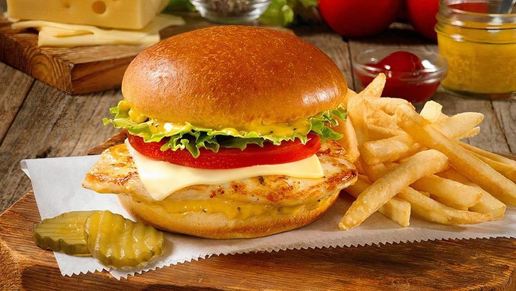 Zesty Grilled Or Crispy Chicken Sandwich · Marinated and seasoned grilled chicken breast, or crispy chicken breast, topped with Swiss cheese, fresh lettuce, tomato, pickle chips and Dijon honey mustard on a toasted brioche bun (Cal 1150-1200)