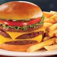 Triple Huddleburger® · Our classic triple burger, melted aged cheddar cheese, lettuce, tomato and pickle chips (Cal...