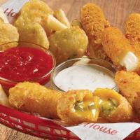 Huddle Up Sampler · Tangy batter-dipped dill pickles, cheddar cheese filled jalapeño poppers and mozzarella stic...