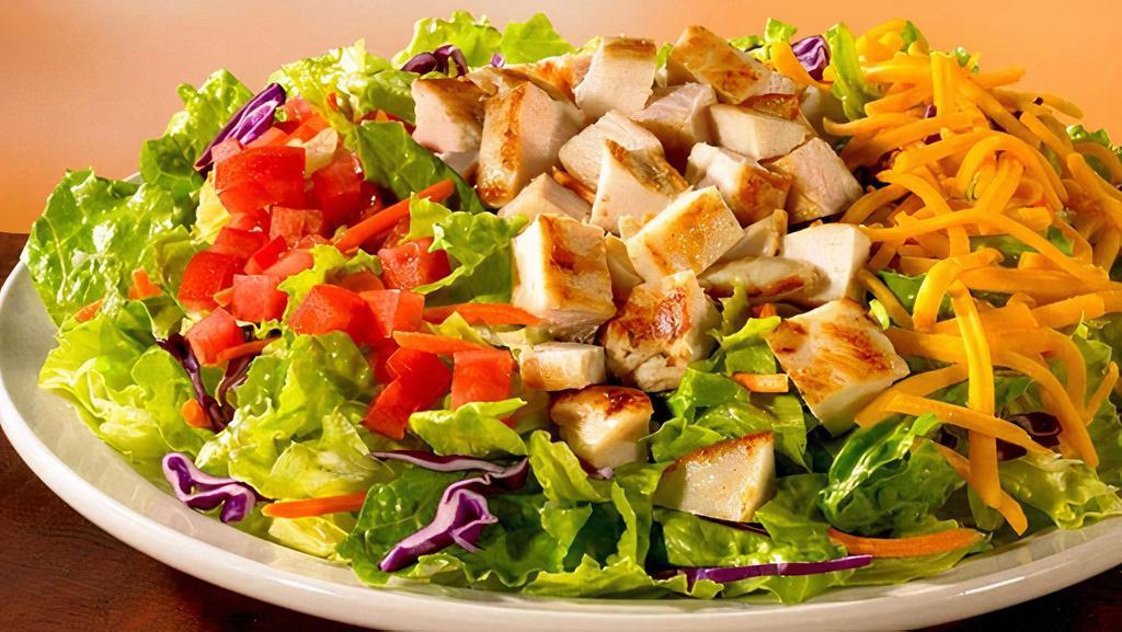 Grilled Chicken Salad · Mixed greens, carrots, red cabbage, tomatoes, eggs, croutons and shredded cheddar cheese. (Cal 370)