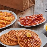 (4) Waffle Family Meal · (4) Golden waffles served with rich syrup and choice of crispy Applewood bacon or country sa...