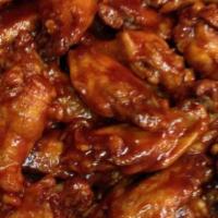 Super Jumbo Wings · Your choice of sauces. Served with ranch or blue cheese dressing.