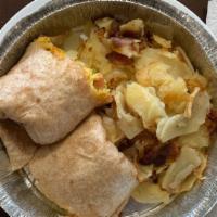 Brookside Favorite Wrap · Flour tortilla stuffed with scrambled eggs, peppers, onions, bacon, and cheddar cheese, serv...