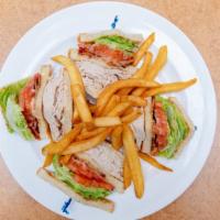 Sliced Breast Of Turkey Club · Roasted turkey breast in-house daily with three slices of crisp bacon, lettuce, tomato, and ...