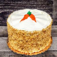Carrot Cake · Carrot cake walnuts, raisins, coconuts and cream cheese icing.