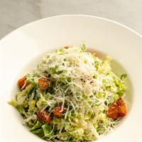 Caesar Salad · Chopped Romaine, croutons, grated parmesan cheese served with caesar dressing on side.