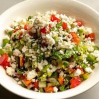 Greek Salad · Chopped Iceberg, romaine, peppers, cucumbers, onion, pepperoncinis, kalamata olives, feta ch...