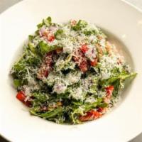 Arugula Salad · Arugula, cherry tomatoes, onion, fresh parmesan cheese served with balsamic dressing on side.