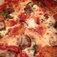 Polpette · Classic red sauce, sliced meatballs, fresh Basil, ricotta and napa cheese blend.