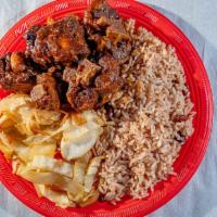 Oxtail · Comes with steam cabbage and plantains and choice of side