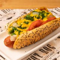 Chicago Dog · Grilled 100% certified angus beef hot dog topped with tomatoes, sport peppers, sweet relish,...