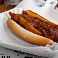 Texas Rodeo Dog · Deep fried bacon wrapped 100% certified angus beef hot dog topped with factory chili, and on...