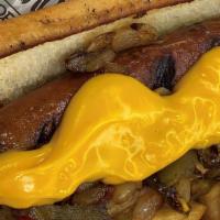 Philly Dog · Beef hot dog topped with onions, peppers, and cheese sauce.  Protein and toppings can be mod...