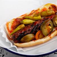Fire Dog · Grilled 100% certified angus beef hot dog topped with Arizona heat hot sauce, jalapeno peppe...