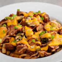 Factory Loaded Fries · Large chili cheese fries with shredded bacon, diced hot dogs, jalapeños, green onions, and t...