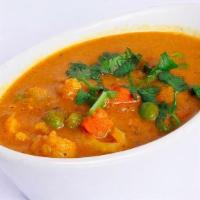 Veg Kurma · Vegetables cooked in a South Indian spiced curry. Served with rice.