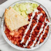 Chicken Over Rice Platter  · Served with chicken, rice, lettuce, and tomatoes along with your favorite toppings and white...