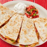 Grilled Shrimp Quesadilla · Melted cheese with grilled shrimps.