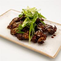 Duck Wings · Choice of five spice, gochujang or teriyaki glaze.