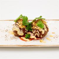 Kobe Meatballs · Pickled daikon, togarashi mayo, fried scallions, cilantro.