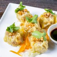 Steamed Thai Dumplings · Favorite. Mix of chicken, shrimp, and shiitake mushroom served with soy sauce.