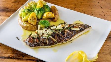 Branzino Limon · Olive oil, rosemary, and garlic, yellow and green squash, asparagus , cauliflower, and fingerling potatoes.<br /><br />