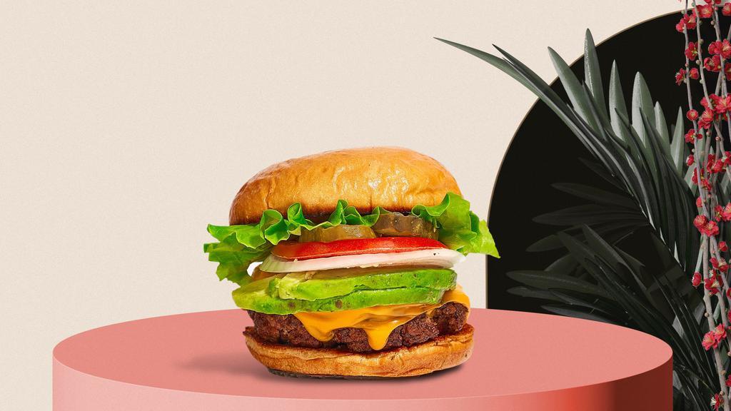 Cadet Cado Burger · American beef patty cooked medium and topped with avocado & melted cheese with lettuce, tomato, onion, and pickles.
