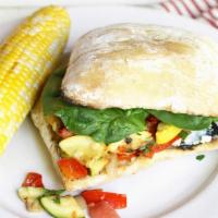 Vegetarian Sandwich · White rice or brown rice, corn salsa, mango chutney, mango salsa, tambourine