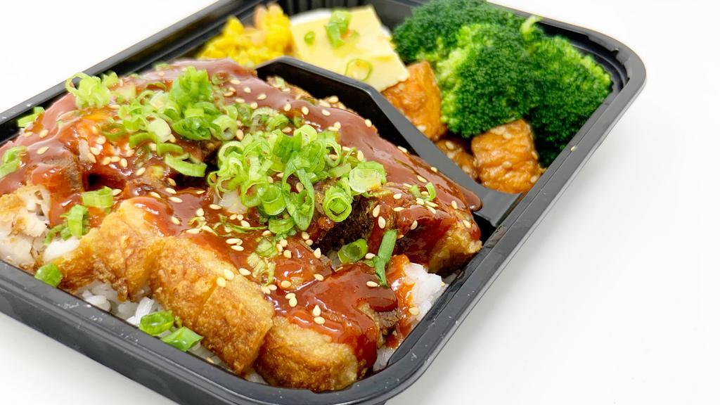 Korean Spicy Pork Belly Bento · Crispy and tender pork belly (5oz), glazed with a sweet and spicy Korean sauce, and has sesame seeds and scallions sprinkled on top.